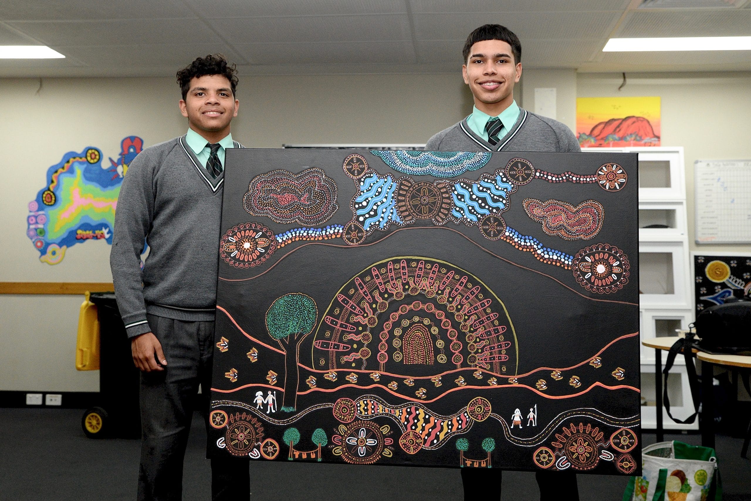 Naz McLean and Tyreece Yeatman show their traditional artwork