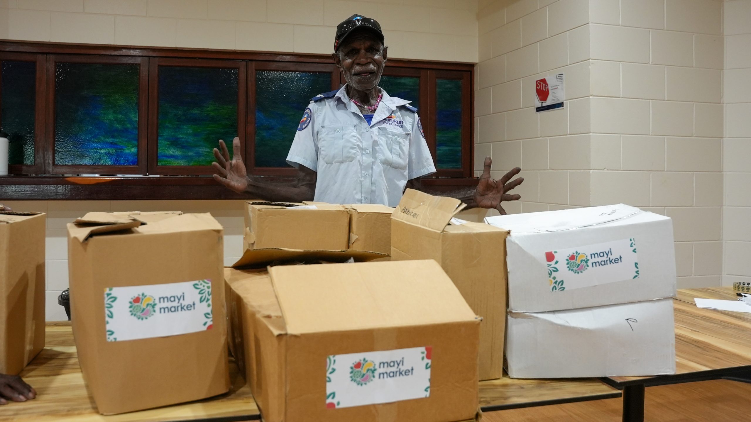 An Aurukun community member with his Mayi Market boxes