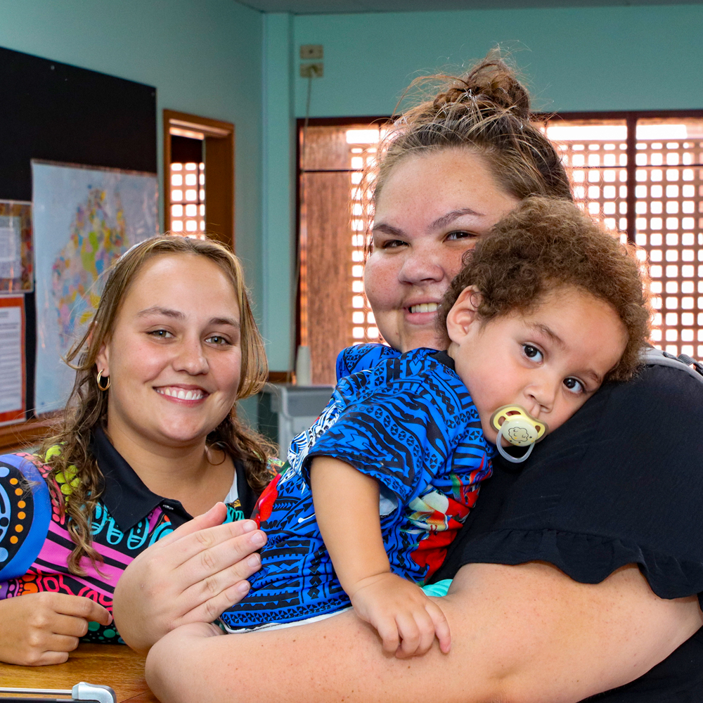 Jayrahni with a young patient and his mother