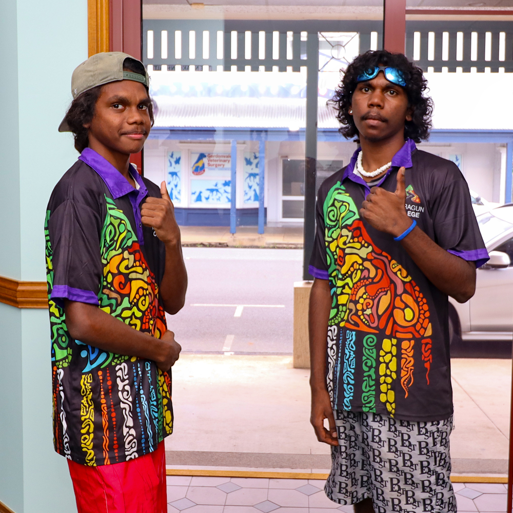 Two Djarragun students giving the thumbs up for a clean bill of health
