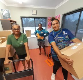 Three ladies in Hope Vale receiving their food and goods packages